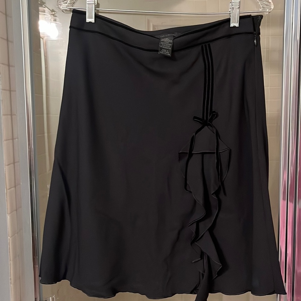 Beautiful black skirt with bow tie embellishment